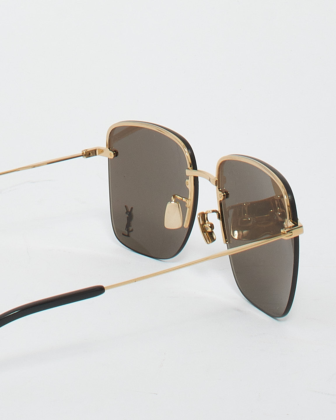 Saint Laurent Lunettes de soleil carrées sans monture en métal doré à verres marron SL312