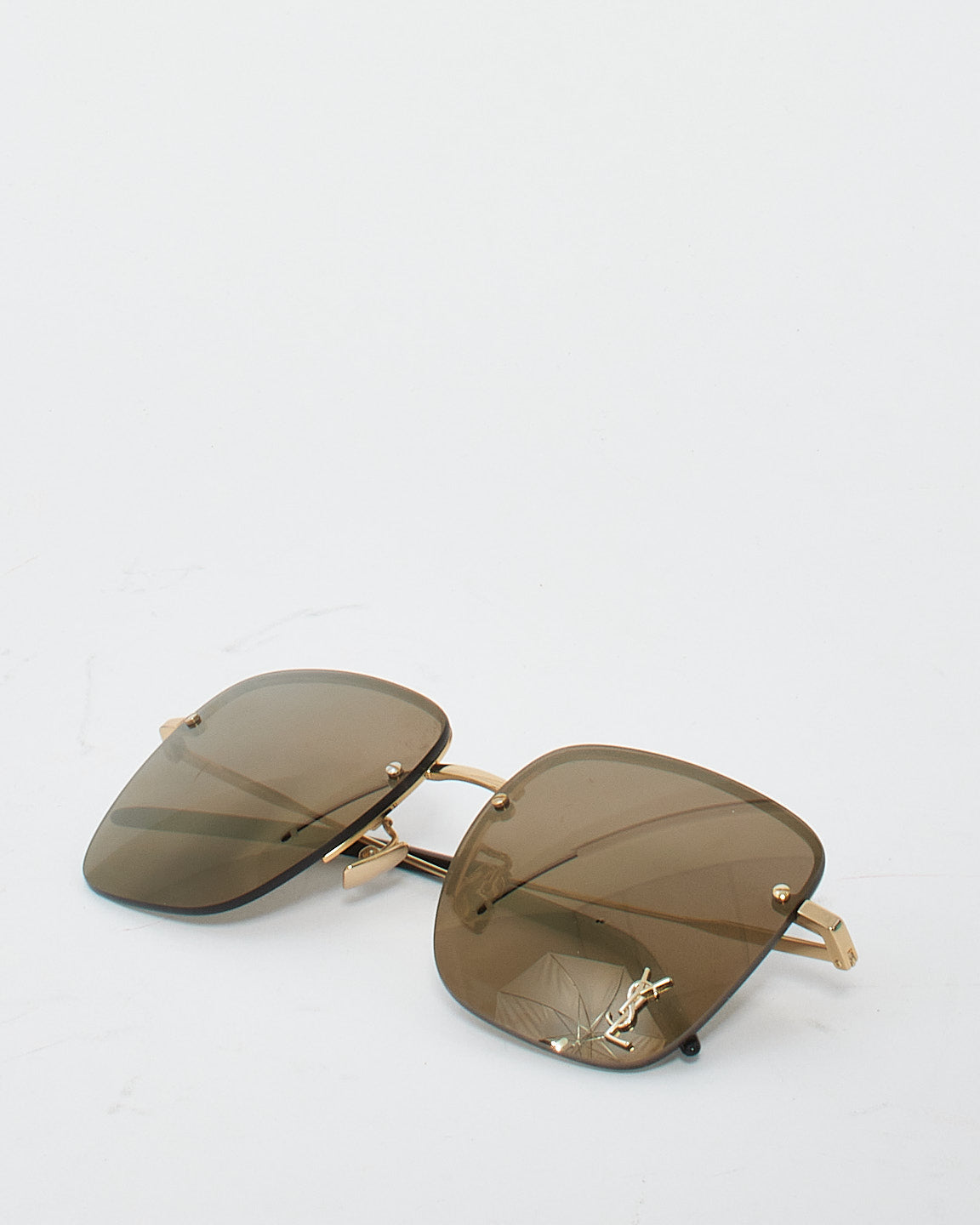 Saint Laurent Lunettes de soleil carrées sans monture en métal doré à verres marron SL312