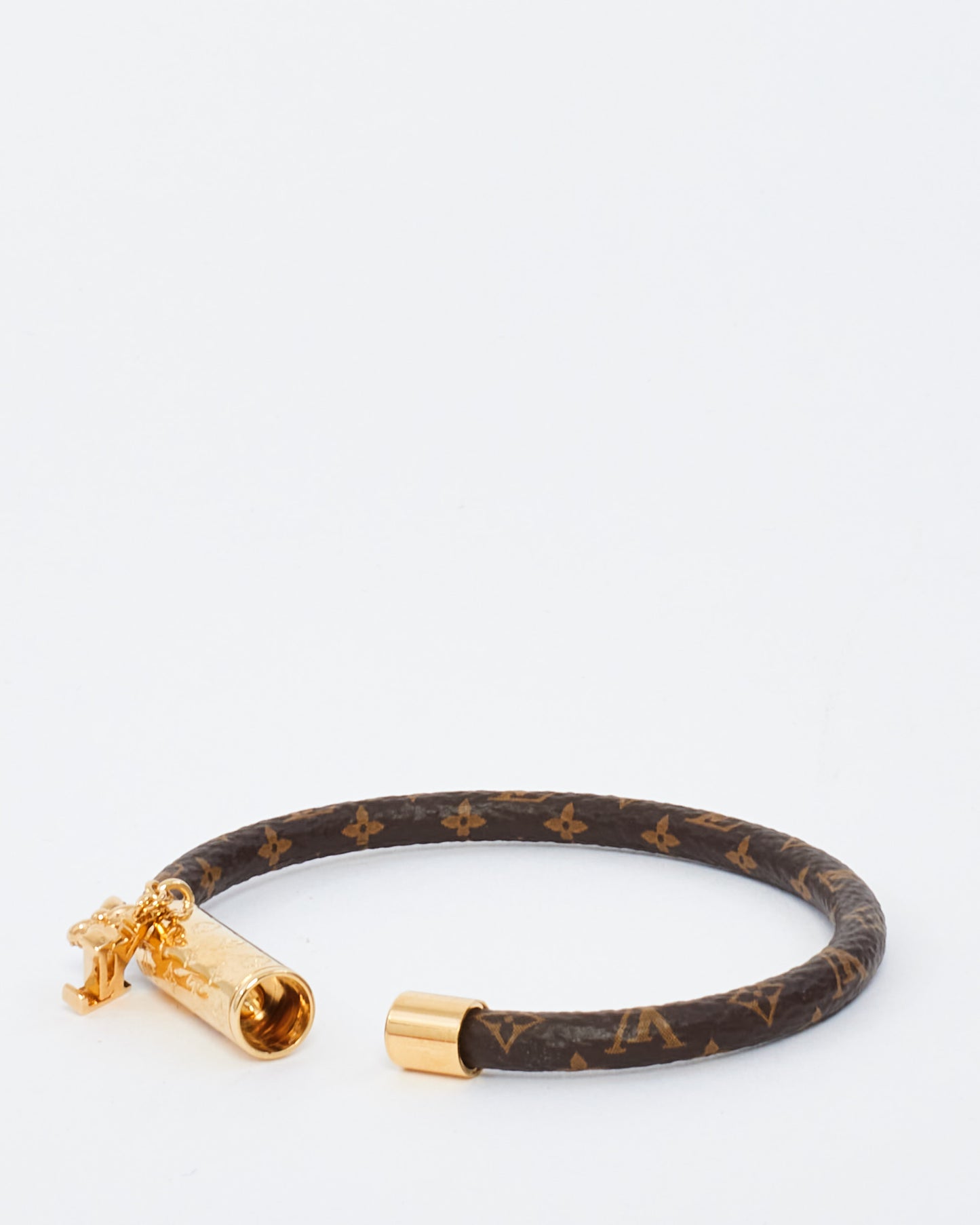 Bracelet en toile monogramme Louis Vuitton avec breloques