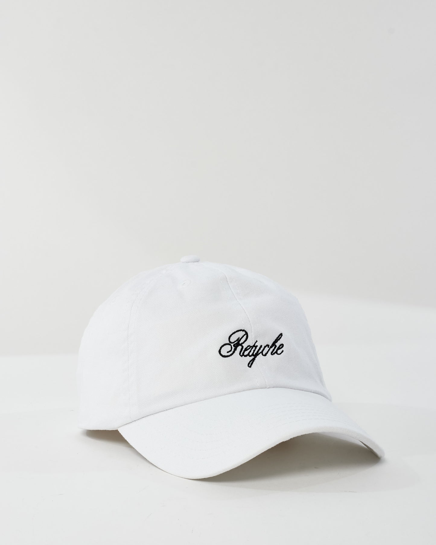 Retyche White Cursive Logo Baseball Cap - O/S