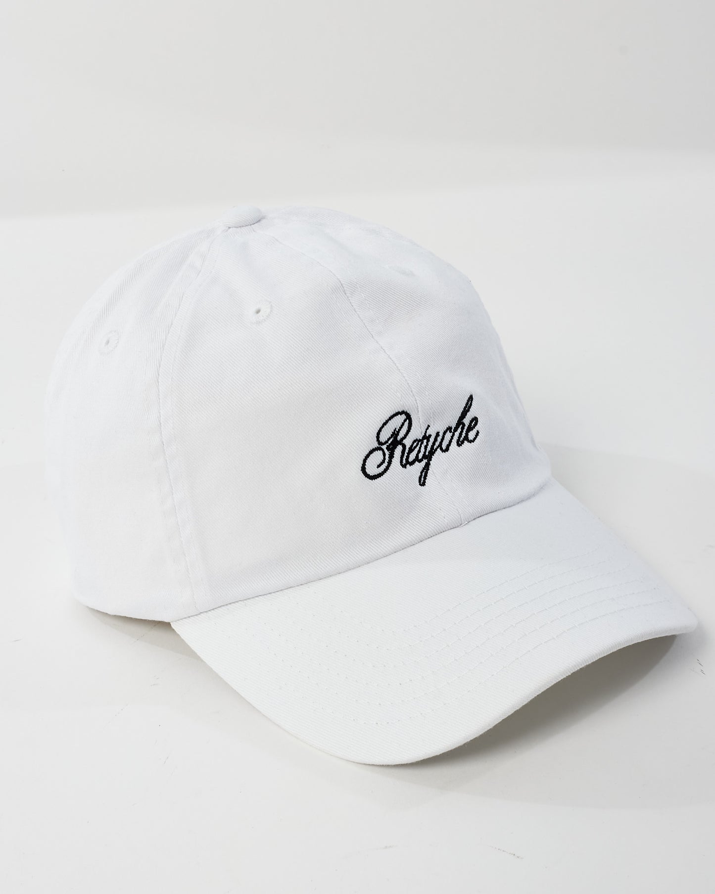 Retyche White Cursive Logo Baseball Cap - O/S