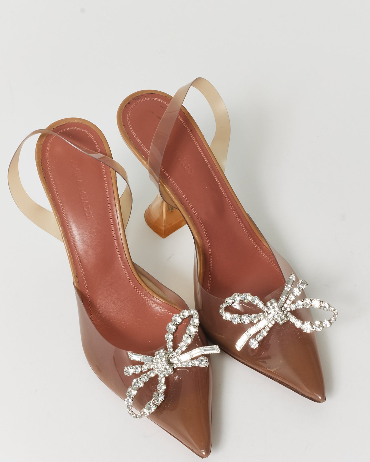 Amina Muaddi Beige PVC Crystal Bow Slingback Pumps - 38.5