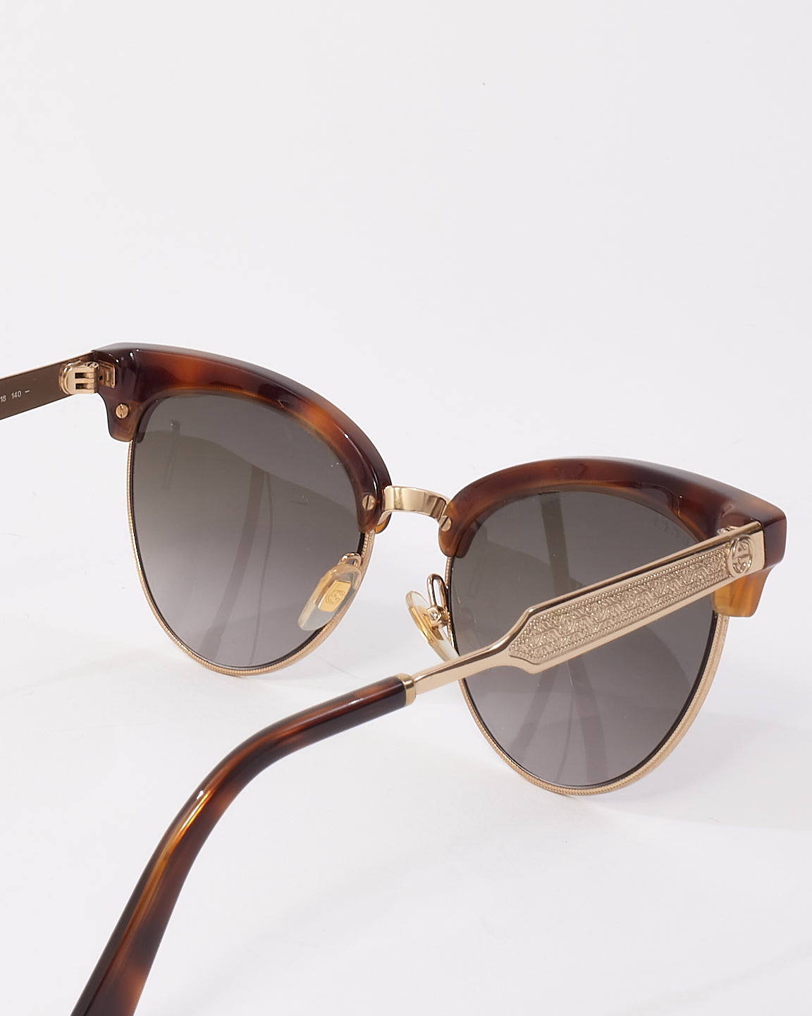 Lunettes de soleil œil de chat en métal doré écaille marron Gucci GG4283