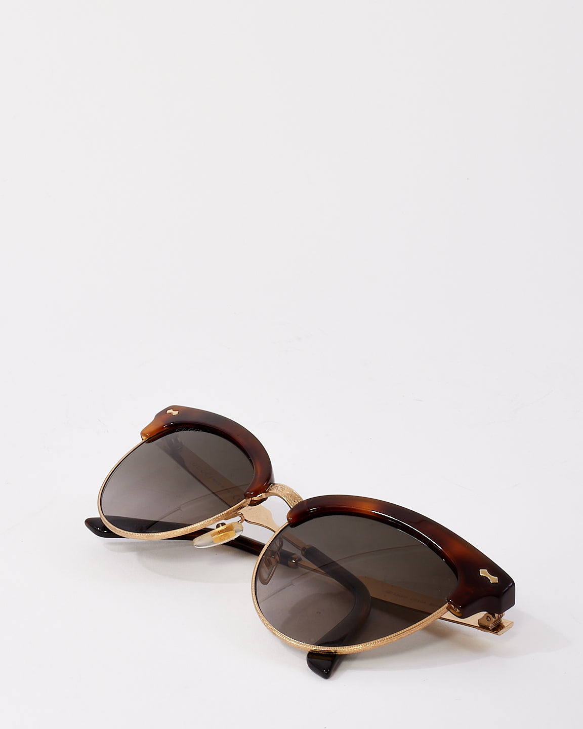 Lunettes de soleil œil de chat en métal doré écaille marron Gucci GG4283