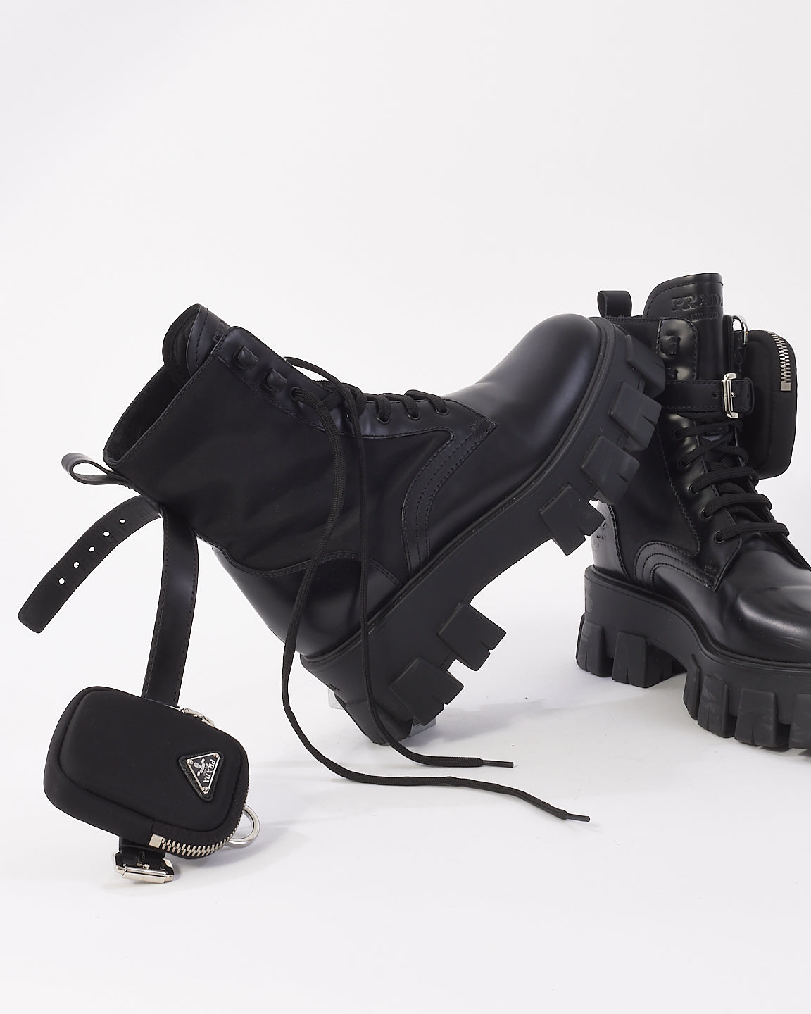 Prada Bottes de combat en cuir monolithe noir et Re-Nylon avec pochette - 38