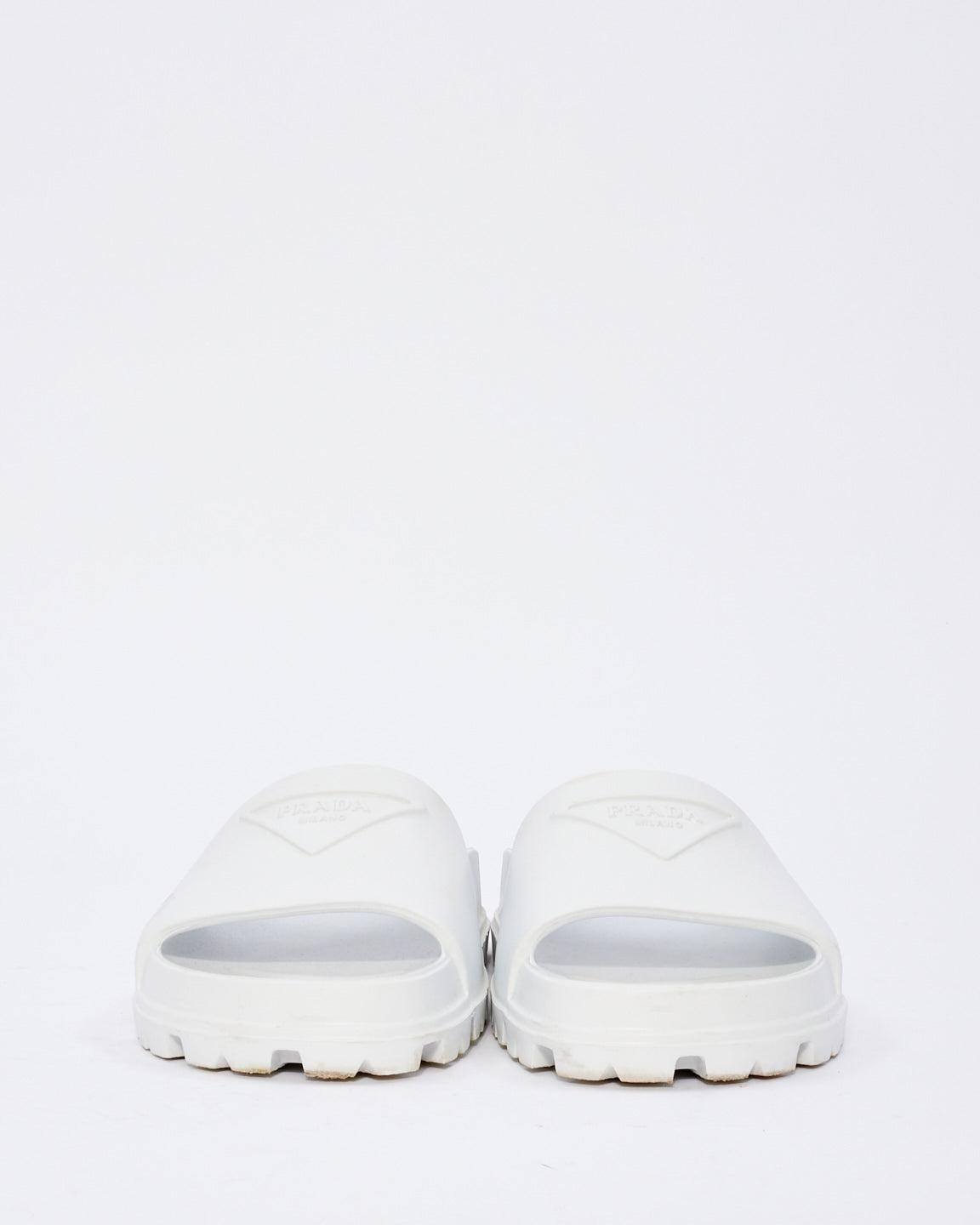 Prada White Rubber Triangle Logo Embossed Lug Sole Slides  - 38