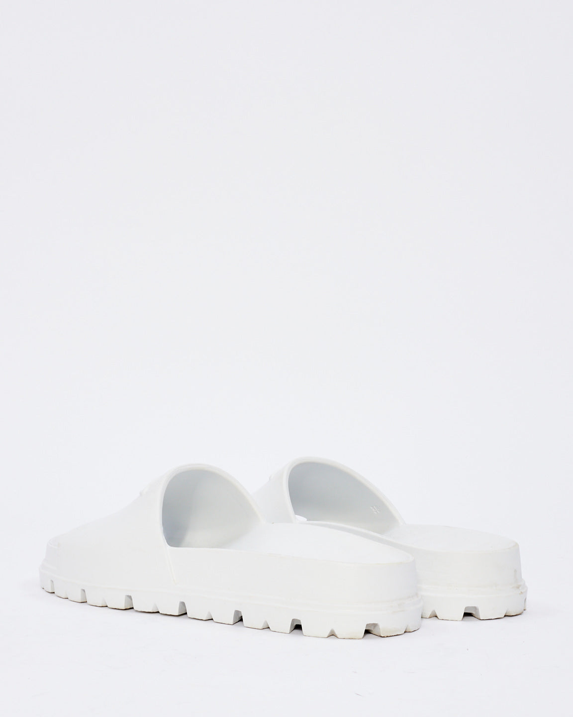 Prada White Rubber Triangle Logo Embossed Lug Sole Slides  - 38