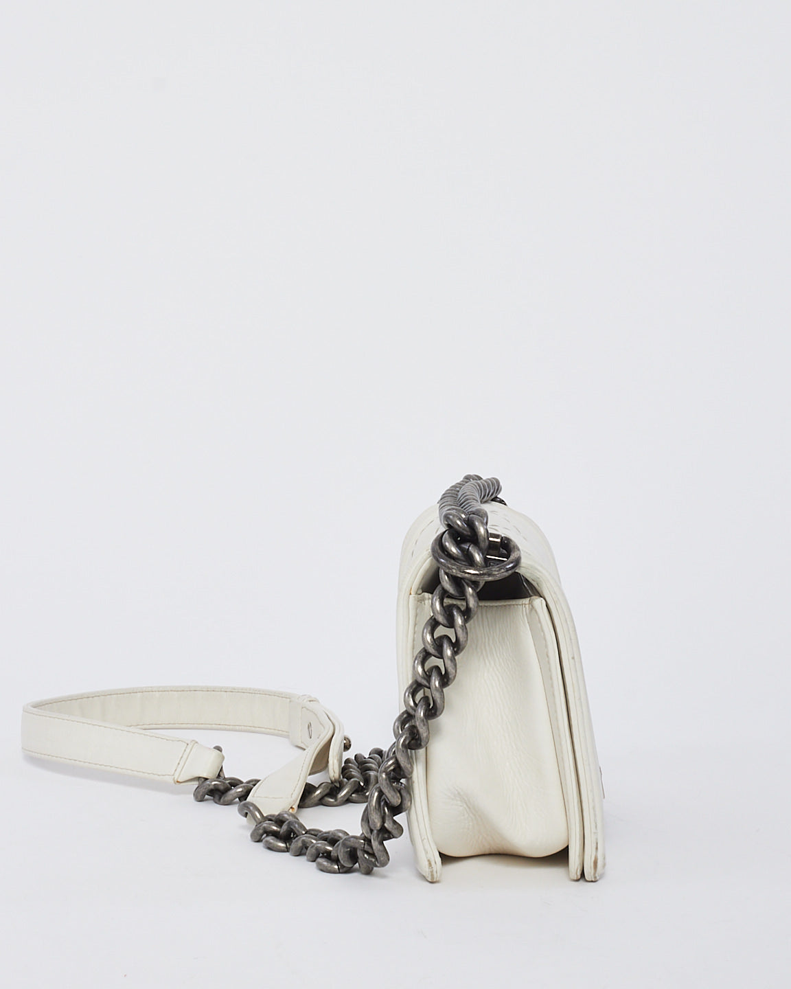 Sac petit garçon en cuir d'agneau matelassé blanc Chanel SHW