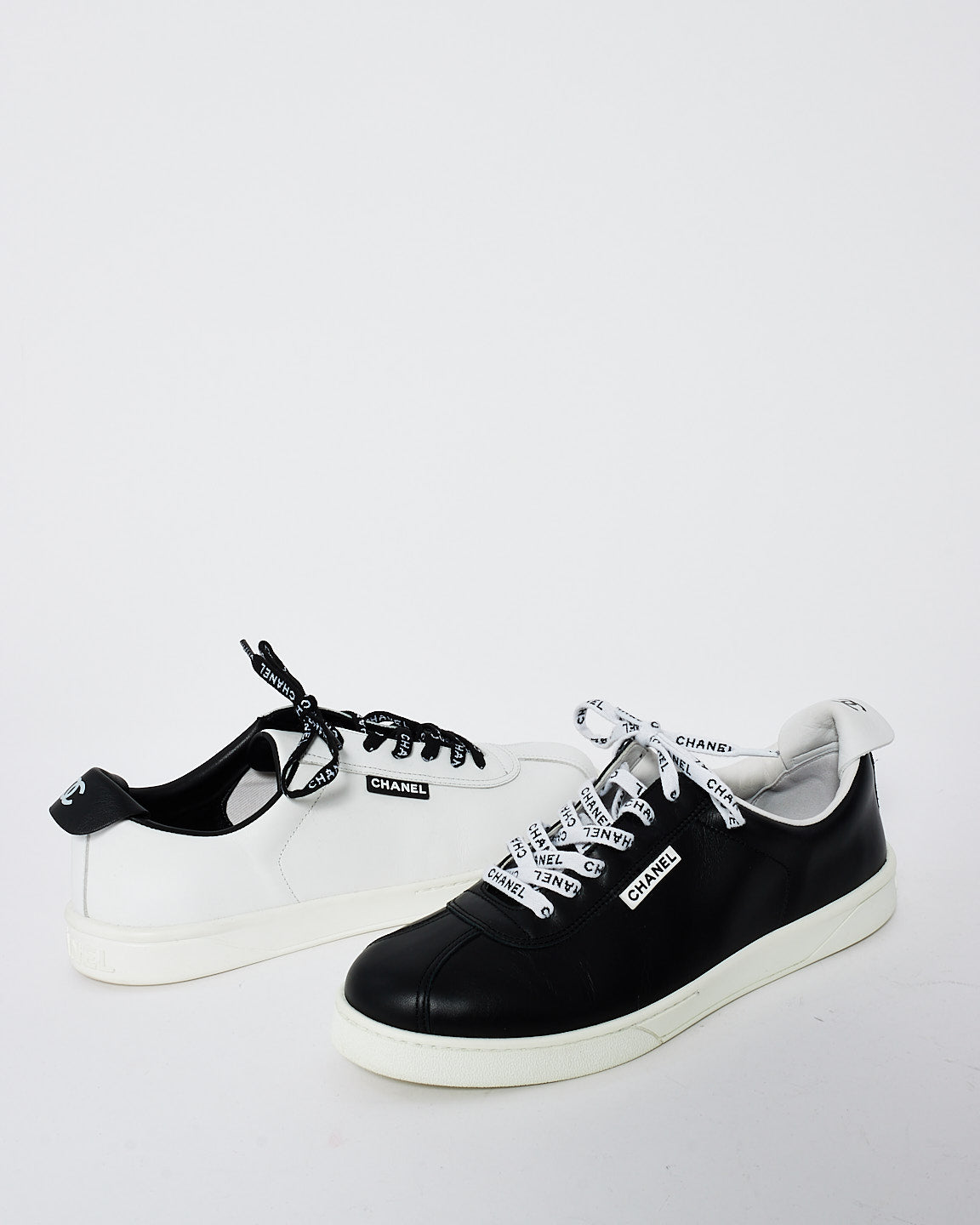 Chanel Men's Black & White Leather Logo Low Top Sneakers -  43