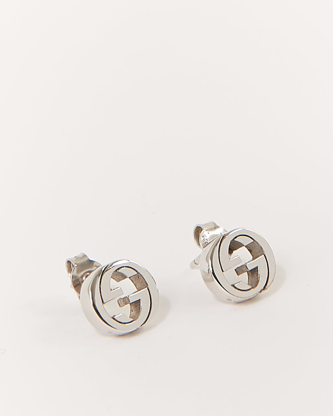 Boucles d'oreilles GG entrelacées en argent Gucci