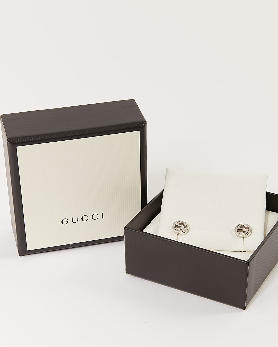 Boucles d'oreilles GG entrelacées en argent Gucci