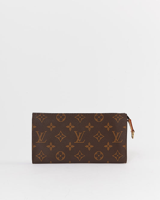 Pochette de toilette en toile monogram Louis Vuitton