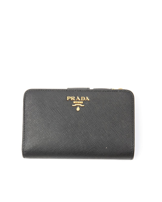 Portefeuille zippé compact en cuir saffiano noir Prada