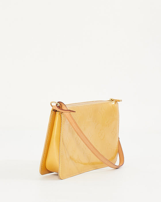Louis Vuitton Lexington Patent Leather Yellow Pochette Bag – Curated by  Charbel