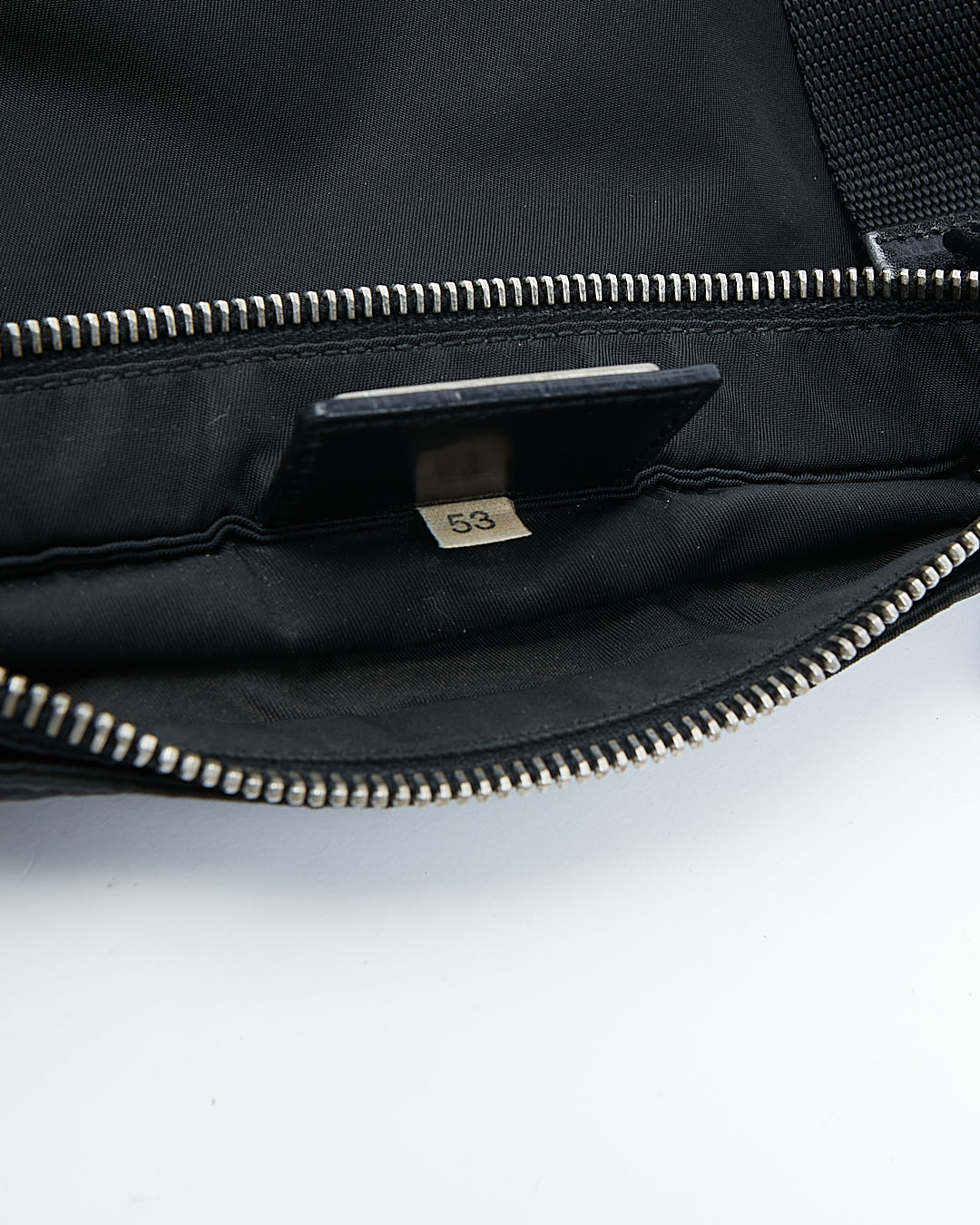 Sac à bandoulière plat en nylon Tessuto noir Prada